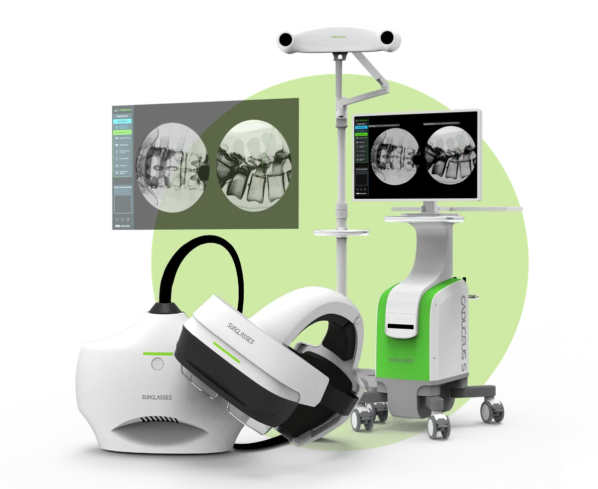 The Caduceus S AR navigation system: the K1 headset in front of the navigation cart and its twin fluoroscopic views